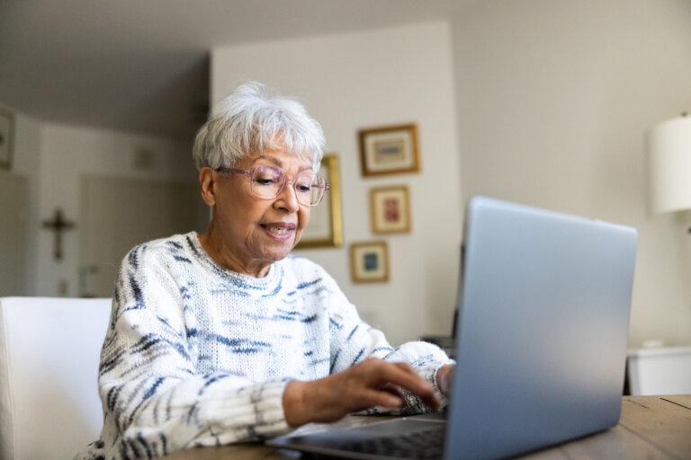 older woman working on computer